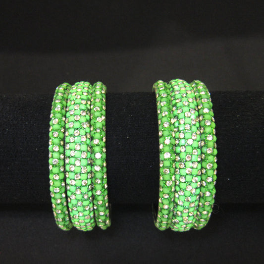 Meher Parrot Green Festive Bangle Set with 2 kada bangles and 4 side bangles featuring parrot green detailing, golden accents and sparkling stones by ENAVA