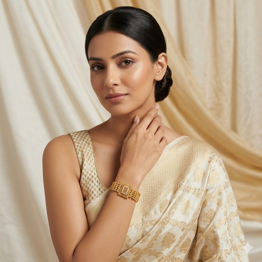 Traditional Rajwadi bracelet by ENAVA featuring antique gold detailing, pearl-inspired centerpiece, heritage craftsmanship, and luxury bridal jewellery aesthetics.
