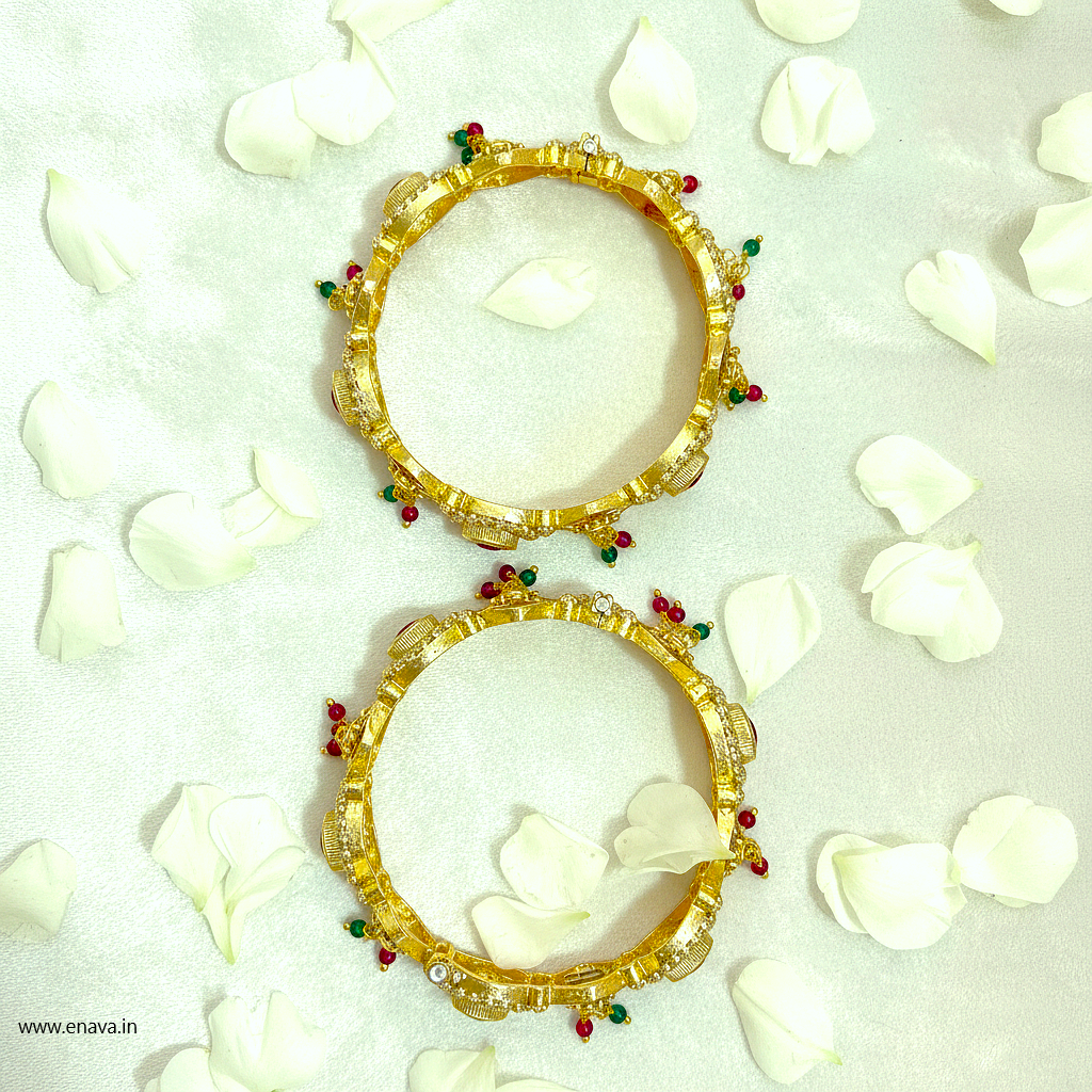 Rajwadi Ruby Green Stones Ghungaru Kundan Gold Plated Bangles by Enava Bangle Enava Jewels.