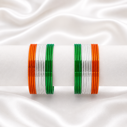 Saffron Trio Glossy Metal Bangles by Enava featuring a premium set of 24 glossy aluminium bangles in saffron, white and green tricolour finish, lightweight waterproof bangles ideal for Independence Day celebrations, patriotic events, festive occasions and ethnic wear.