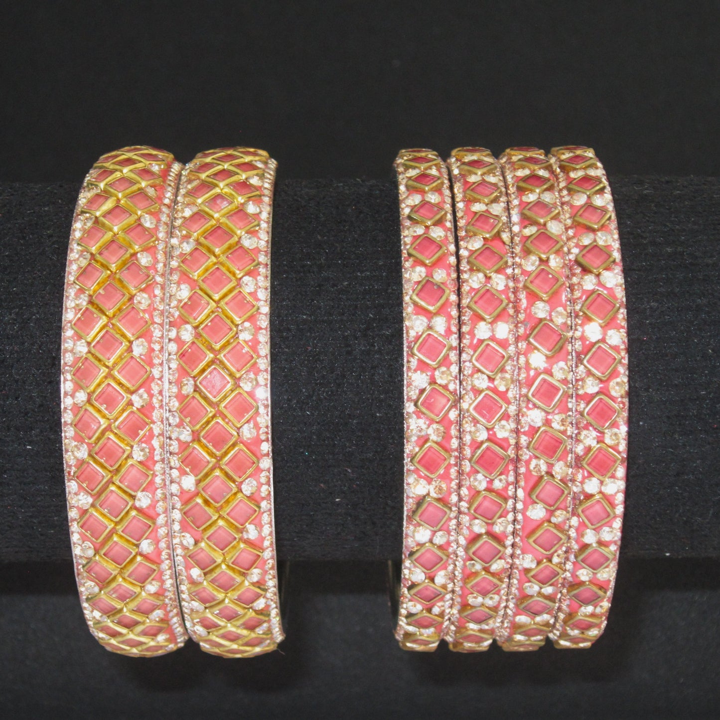 Sitara Gajari Peach Festive Bangle Set with 2 kada bangles and 4 side bangles featuring gajari peach detailing, golden latticework and sparkling stones by ENAVA