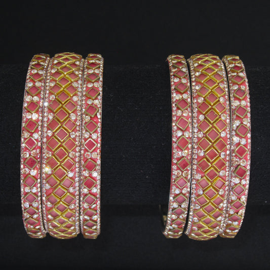 Sitara Gajari Peach Festive Bangle Set with 2 kada bangles and 4 side bangles featuring gajari peach detailing, golden latticework and sparkling stones by ENAVA
