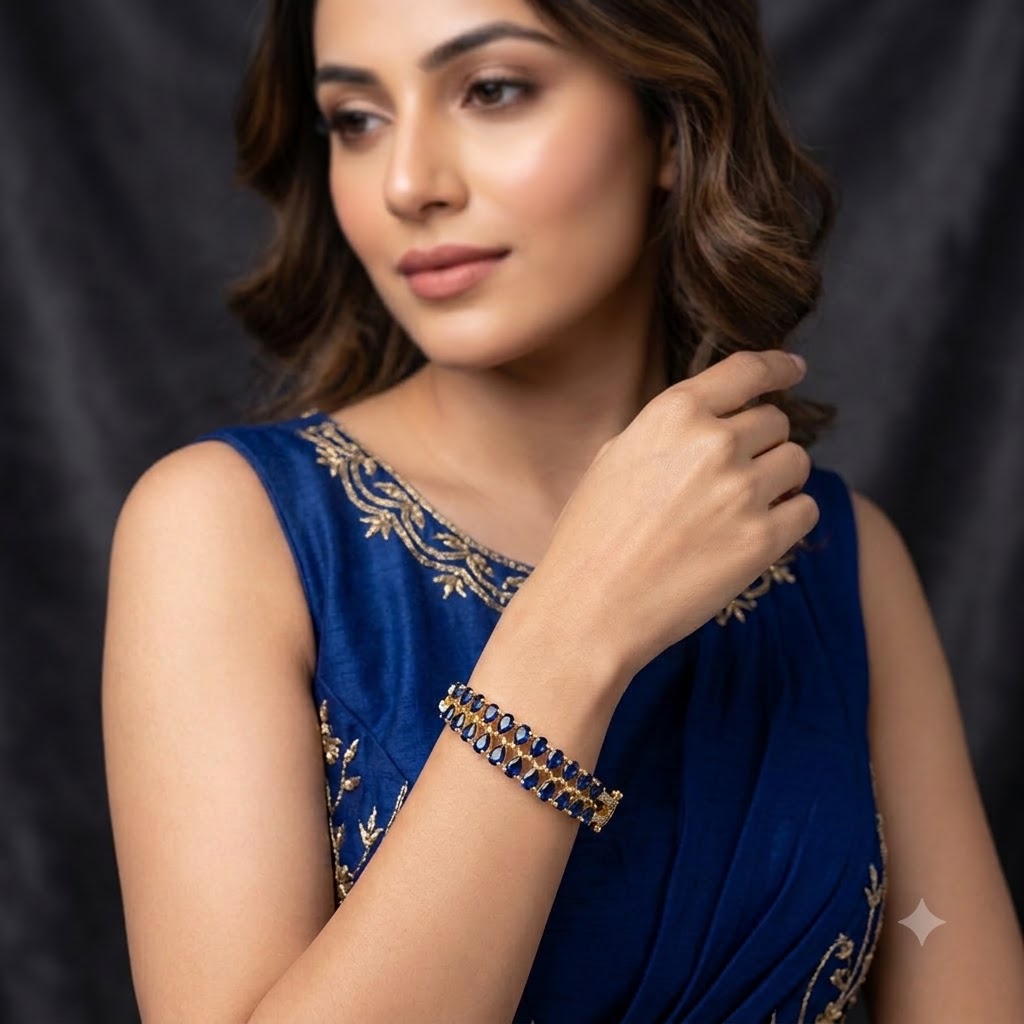 Blue Stones AD Bracelet with a series of deep blue American Diamond stones, sparkling AD detailing and gold-tone finish, elegant designer bracelet for women by ENAVA.