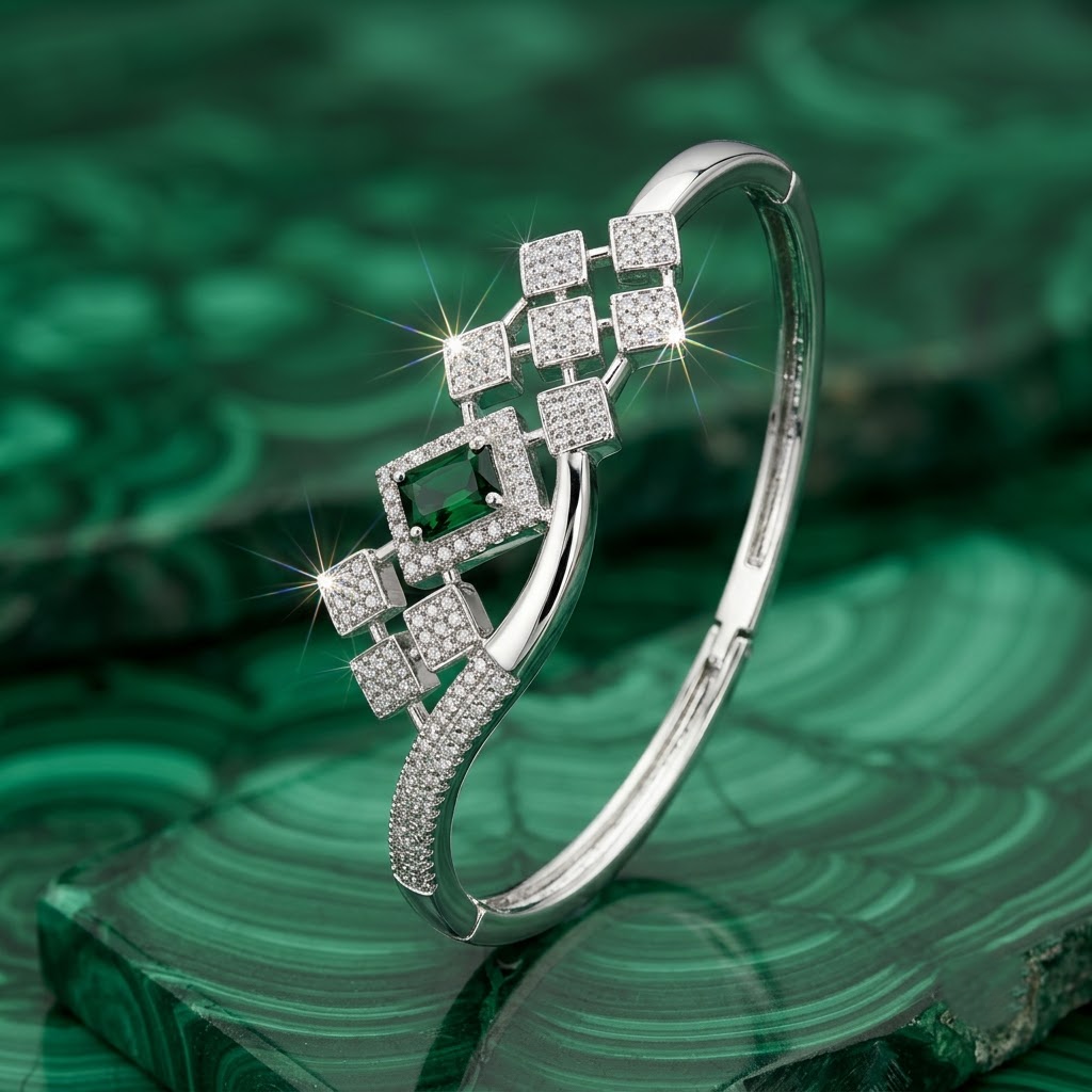 Cubix Royal Green Emerald Bracelet with complete American Diamond square pattern design and green emerald center stone, elegant geometric designer bracelet for women by ENAVA.