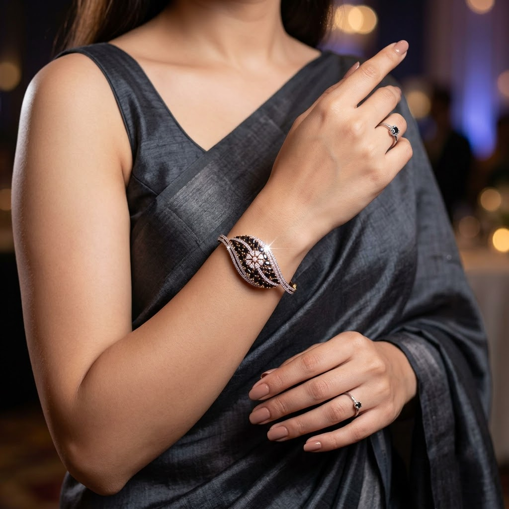 Eclipse Black AD Bracelet with black American Diamond AD stones in an elegant designer pattern, sophisticated statement bracelet for women by ENAVA.