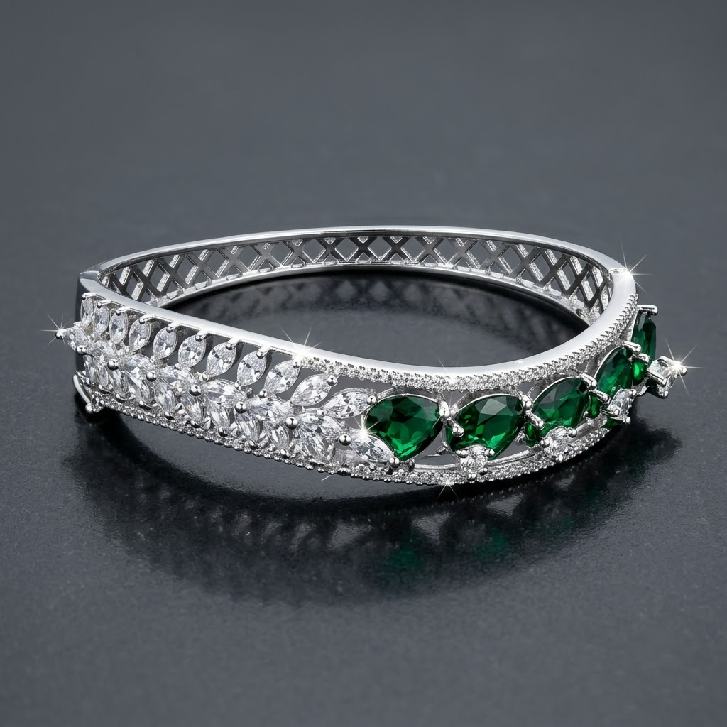 Emerald Dreams Sparkling AD Bracelet with wavy curve design, sparkling American Diamond stones and emerald green stone motifs, elegant designer bracelet for women by ENAVA.