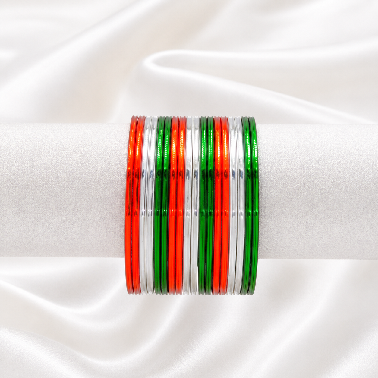 Eternal Tiranga Glossy Metal Bangles by Enava featuring a premium set of 24 glossy aluminum bangles in saffron, white, and green tricolor combination for Independence Day celebrations, patriotic events, cultural programs, festive occasions, and traditional ethnic wear.