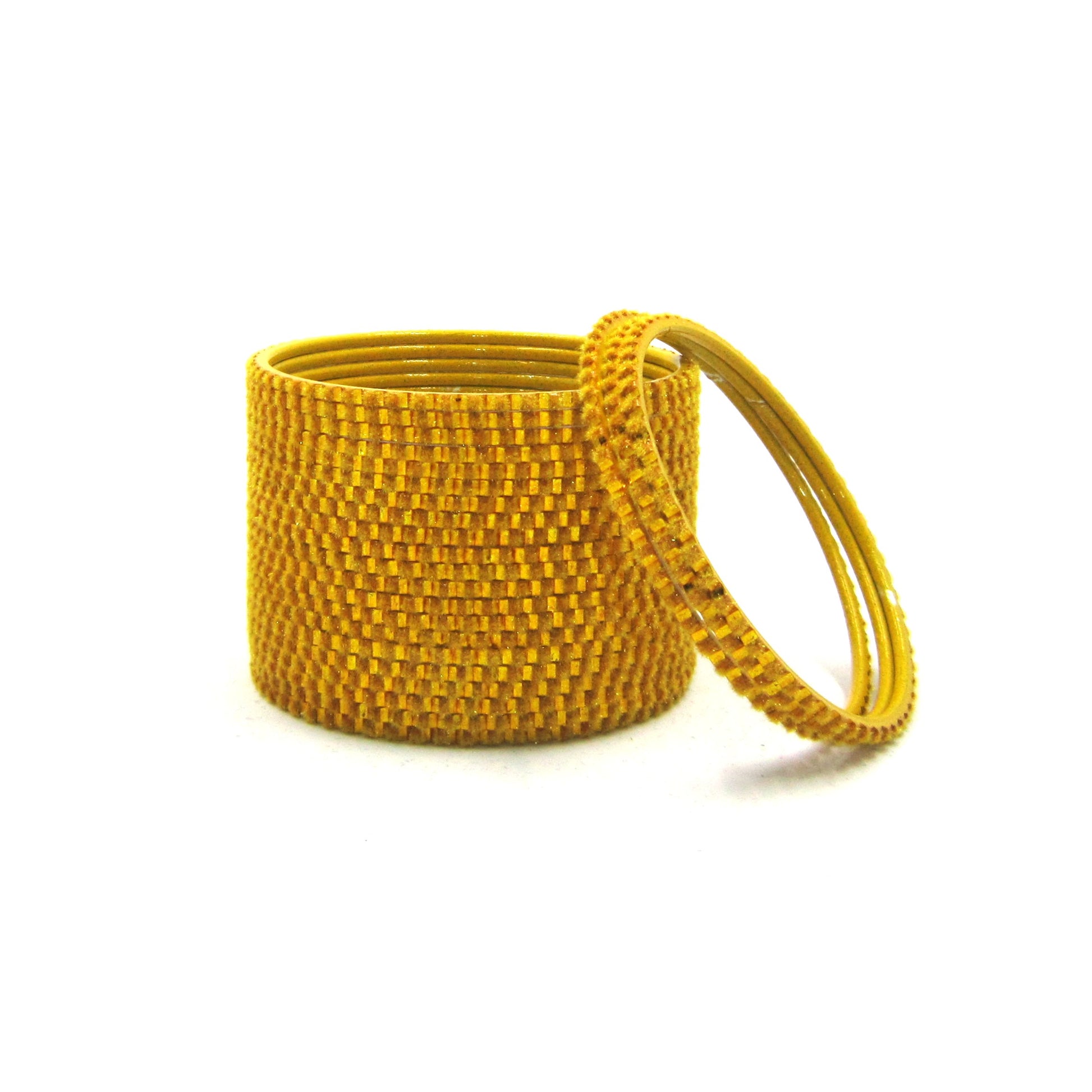 Glam Mango Yellow Metal 24 Bangles by ENAVA featuring a luxurious velvet and glossy finish. Premium Plain Designer Metal Bangles for women, ideal for Haldi ceremonies, weddings, festive occasions, parties, and everyday styling.