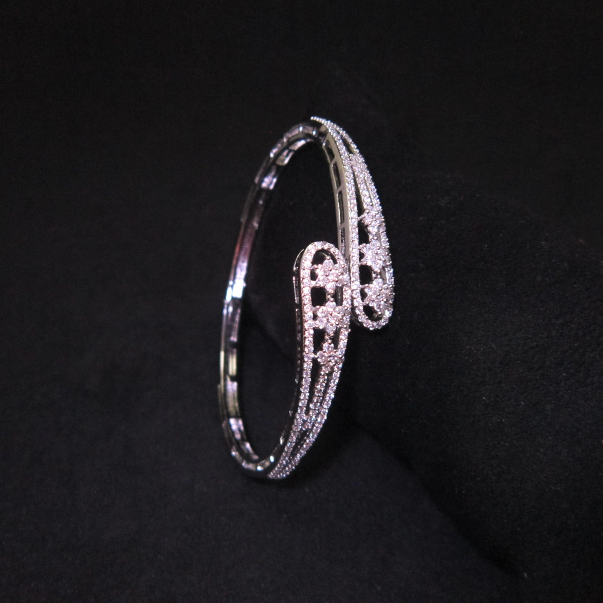Indique AD Bracelet with sparkling American Diamond stones and silver rhodium plating, slim elegant designer bracelet for women by ENAVA.