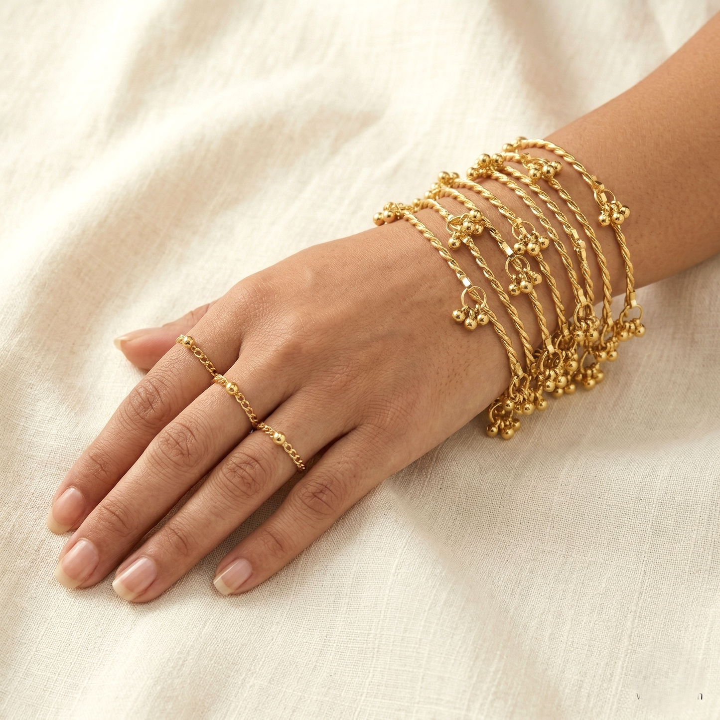 Kashmiri Ghungroo Charm Twisted 8 Bangles Set by Enava
