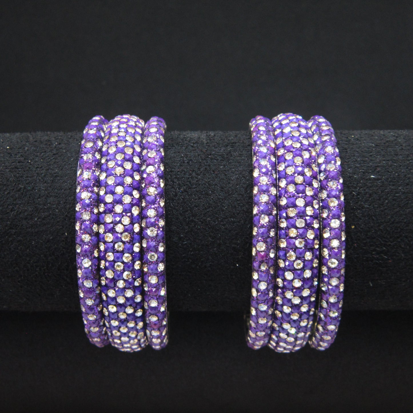 Meher Dark Purple Festive Bangle Set with 2 kada bangles and 4 side bangles featuring dark purple detailing, golden accents and sparkling stones by ENAVA