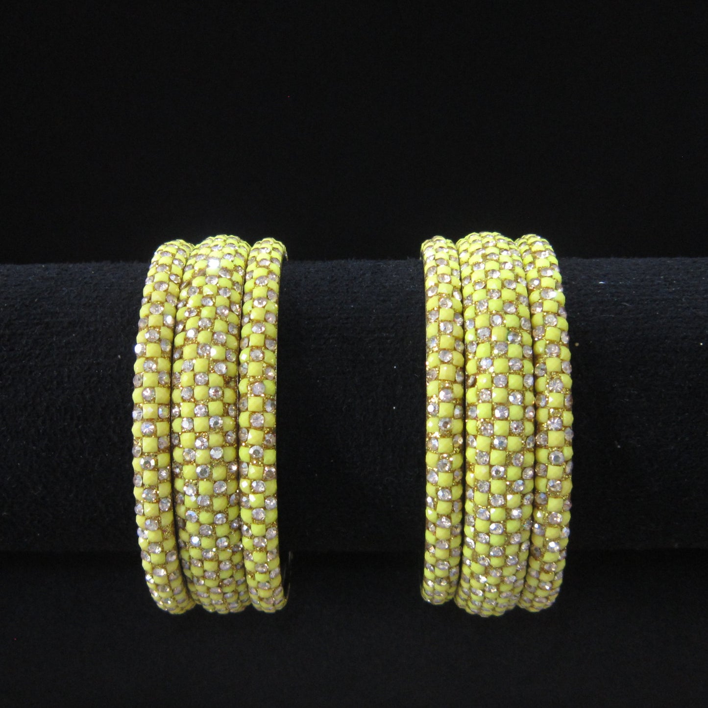 Meher Lemon Yellow Festive Bangle Set with 2 kada bangles and 4 side bangles featuring lemon yellow detailing, golden accents and sparkling stones by ENAVA