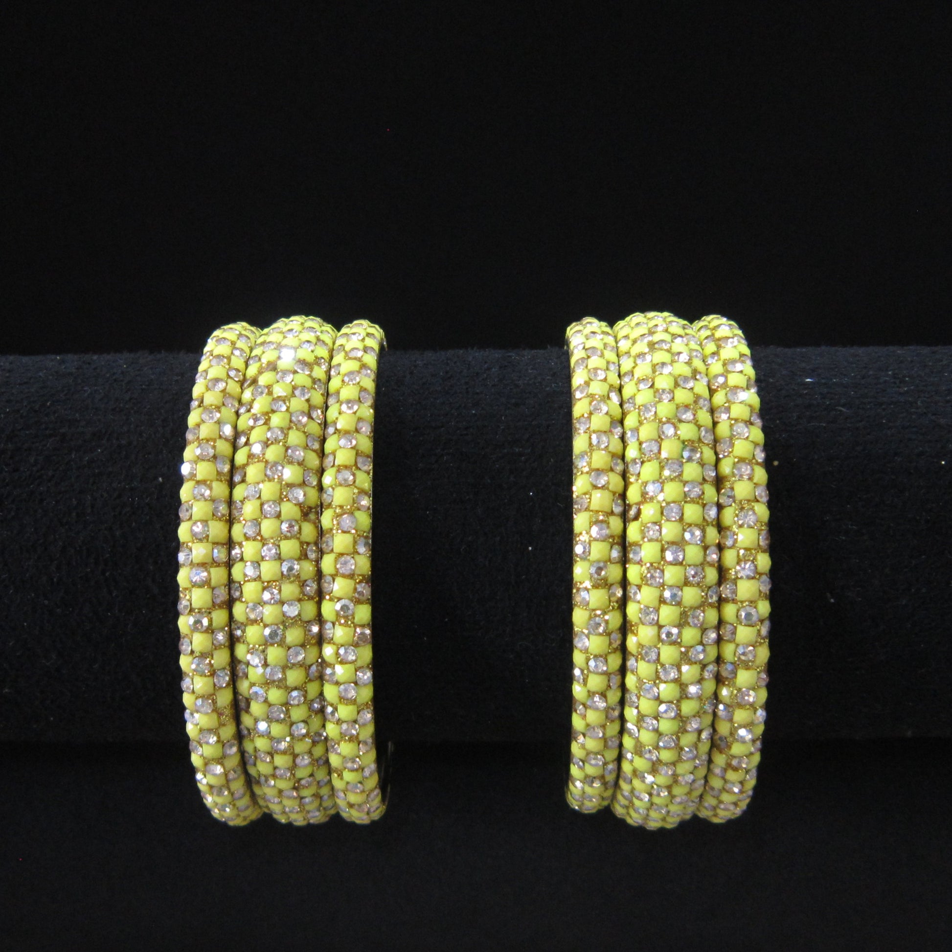 Meher Lemon Yellow Festive Bangle Set with 2 kada bangles and 4 side bangles featuring lemon yellow detailing, golden accents and sparkling stones by ENAVA