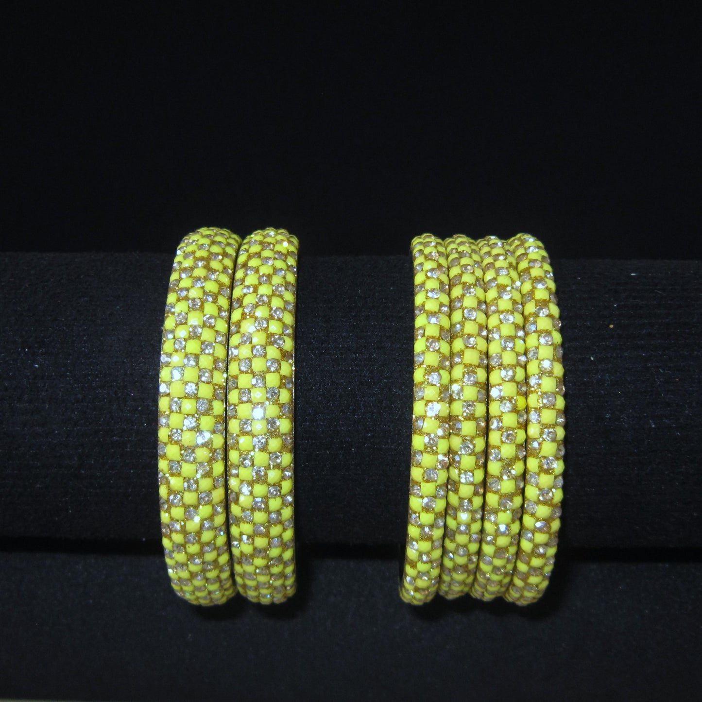 Meher Lemon Yellow Festive Bangle Set with 2 kada bangles and 4 side bangles featuring lemon yellow detailing, golden accents and sparkling stones by ENAVA