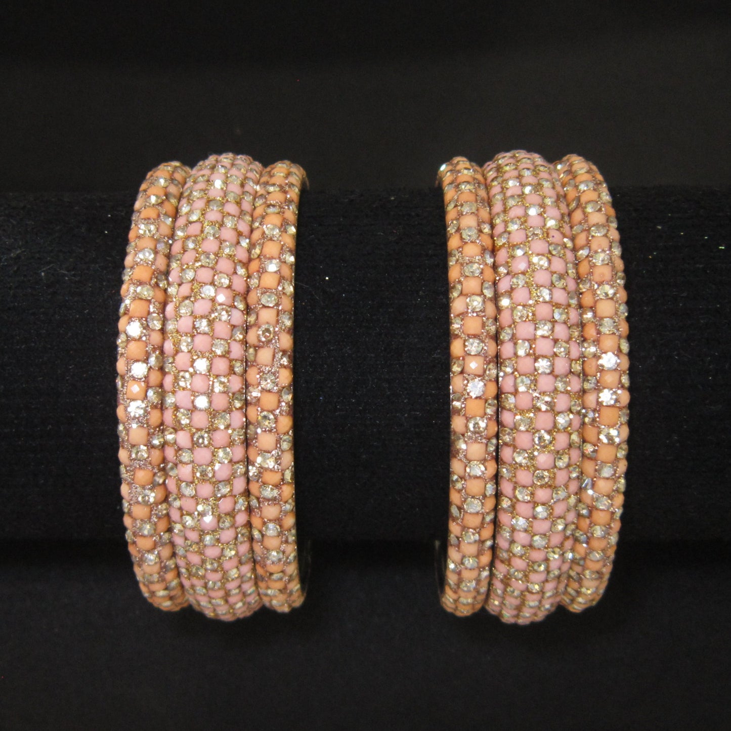 Meher Light Peach Festive Bangle Set with 2 kada bangles and 4 side bangles featuring light peach detailing, golden accents and sparkling stones by ENAVA