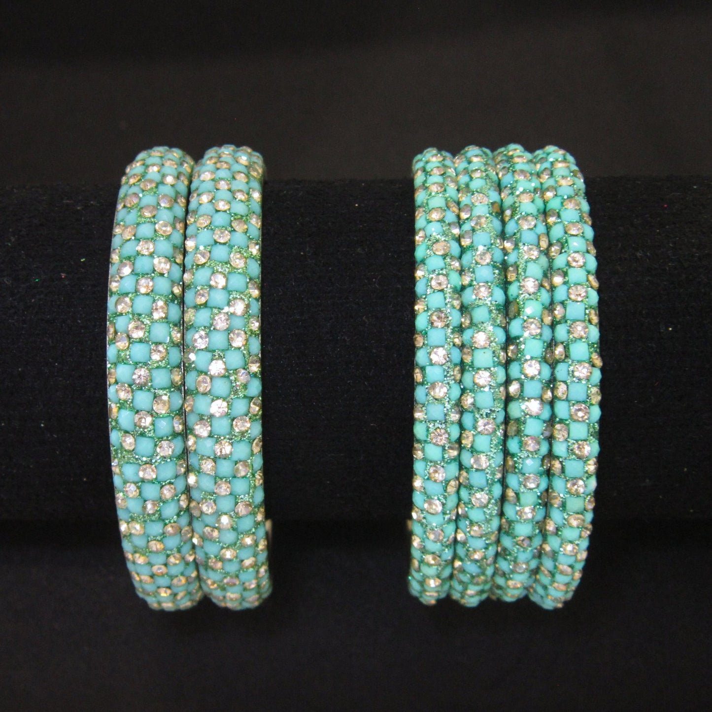 Meher Light Turquoise Festive Bangle Set with 2 kada bangles and 4 side bangles featuring light turquoise detailing, golden accents and sparkling stones by ENAVA