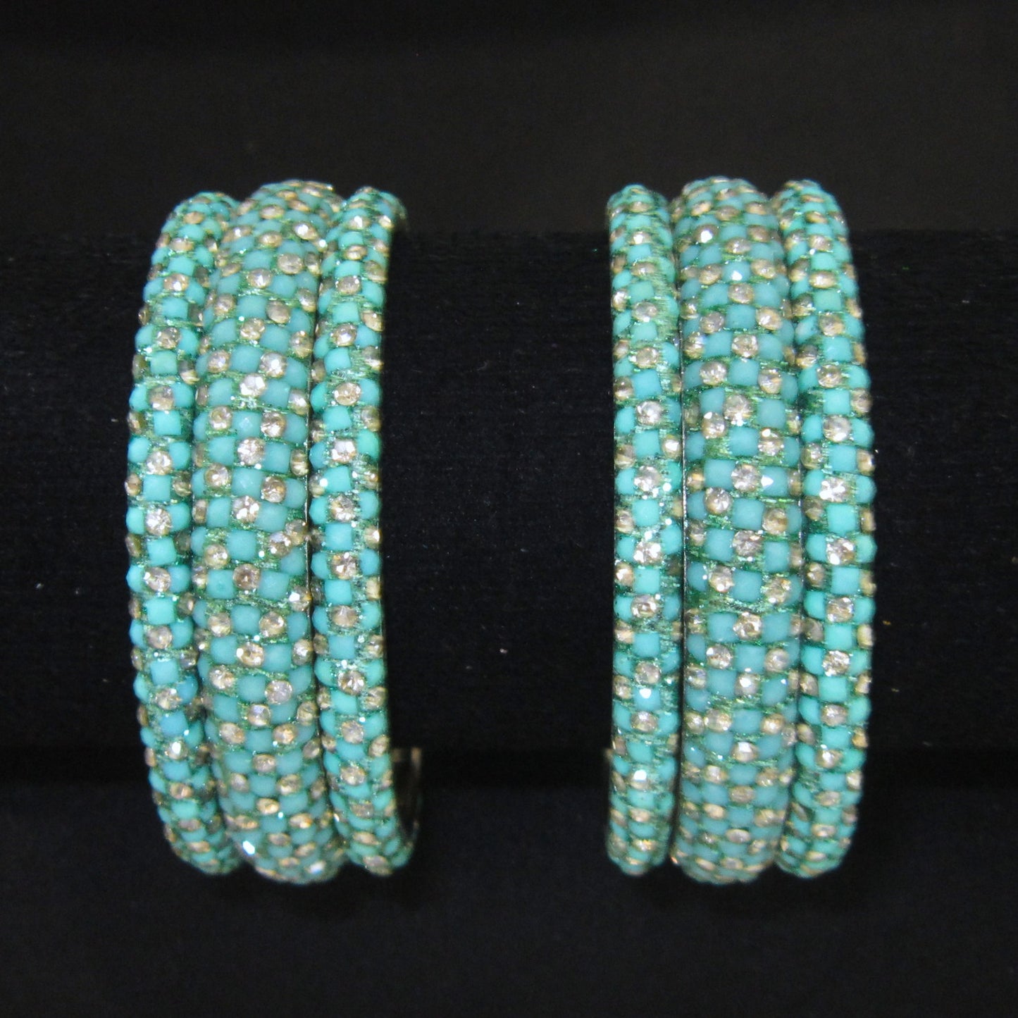 Meher Light Turquoise Festive Bangle Set with 2 kada bangles and 4 side bangles featuring light turquoise detailing, golden accents and sparkling stones by ENAVA