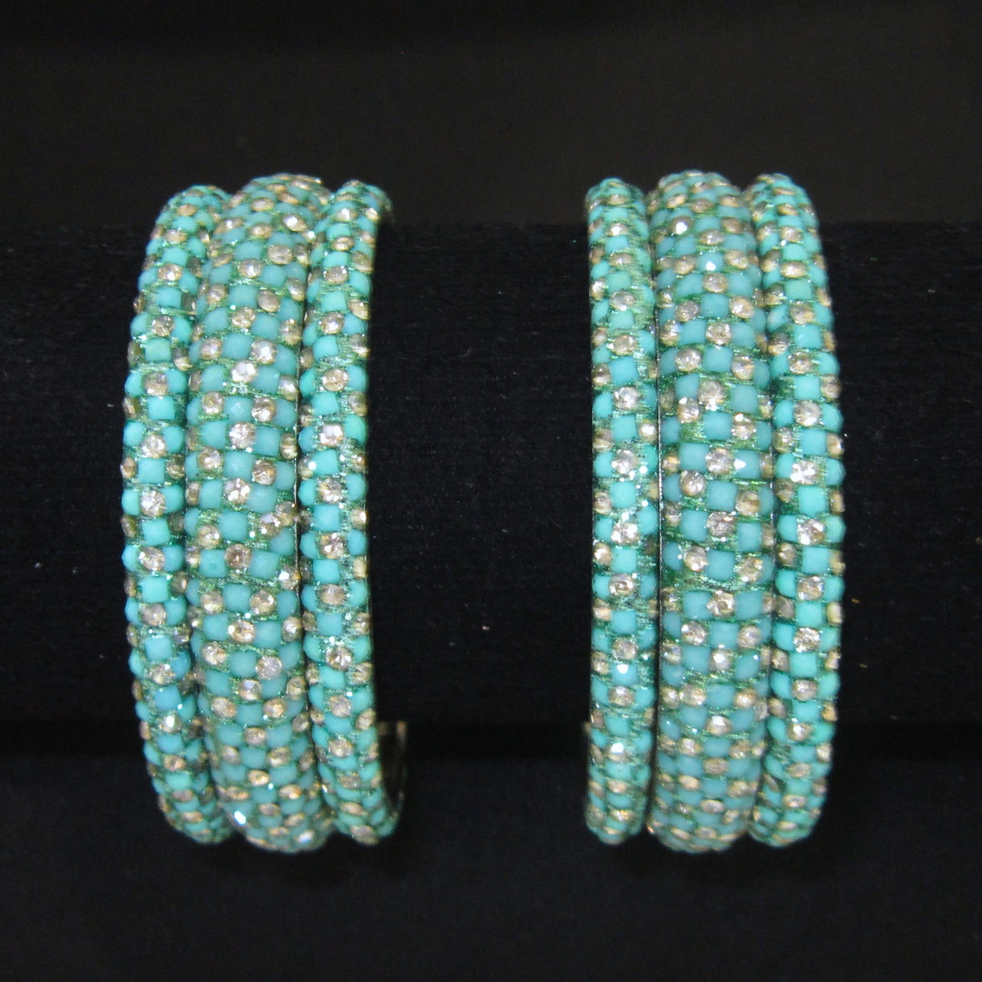 Meher Light Turquoise Festive Bangle Set with 2 kada bangles and 4 side bangles featuring light turquoise detailing, golden accents and sparkling stones by ENAVA