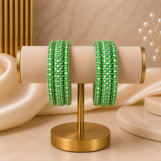 Meher Parrot Green Festive Bangle Set with 2 kada bangles and 4 side bangles featuring parrot green detailing, golden accents and sparkling stones by ENAVA