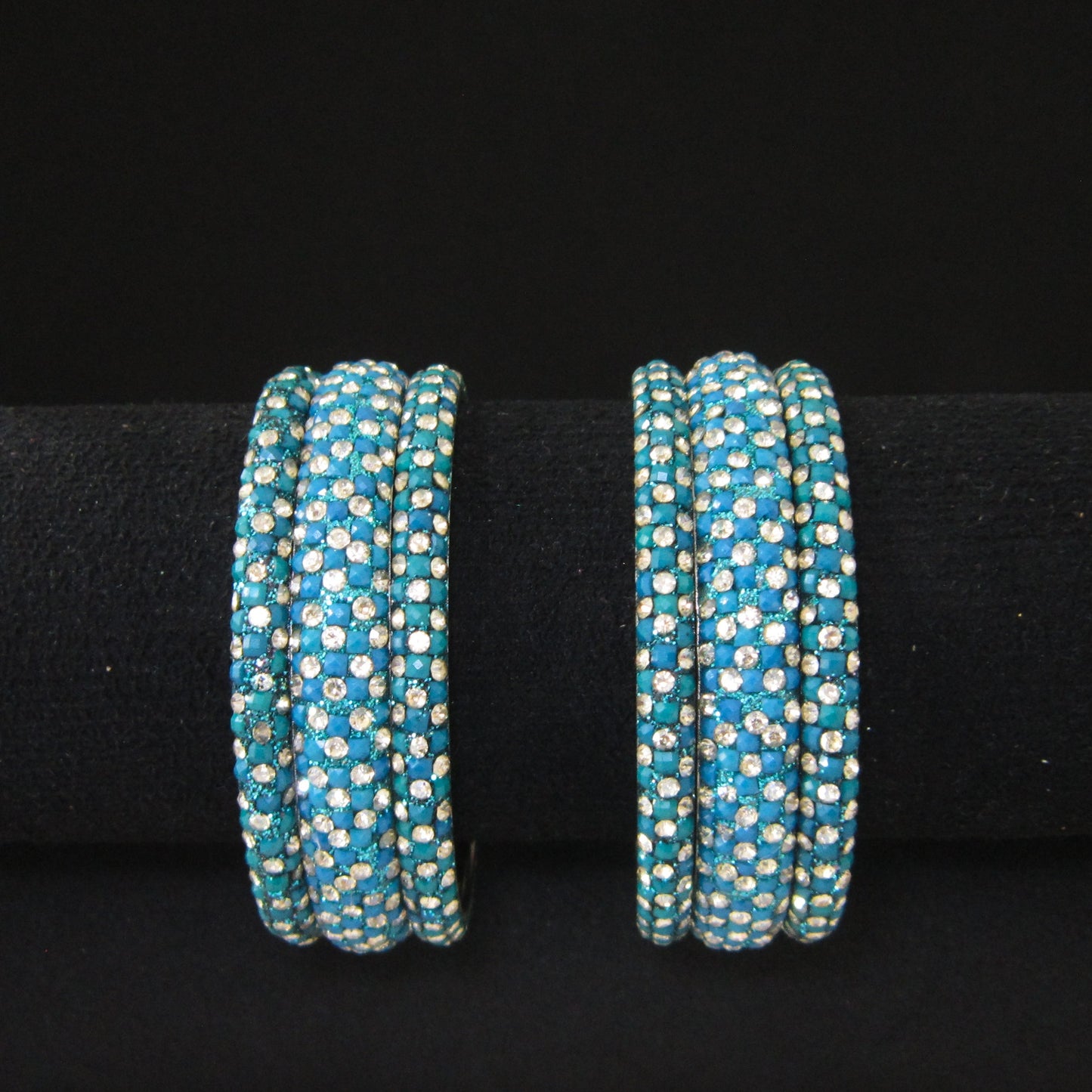 Meher Peacock Festive Bangle Set with 2 kada bangles and 4 side bangles featuring peacock green-blue detailing, golden accents and sparkling stones by ENAVA