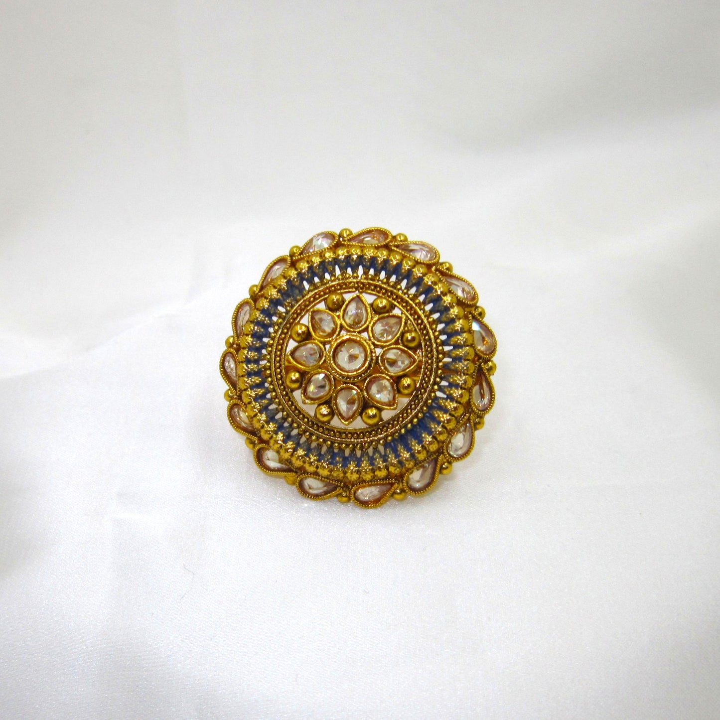 Neelam Ethnic & Traditional Antique Finish Ring by Enava featuring white kundan stones, blue enamel detailing, and antique gold finish in a Rajwadi-inspired floral statement design for ethnic and festive wear.