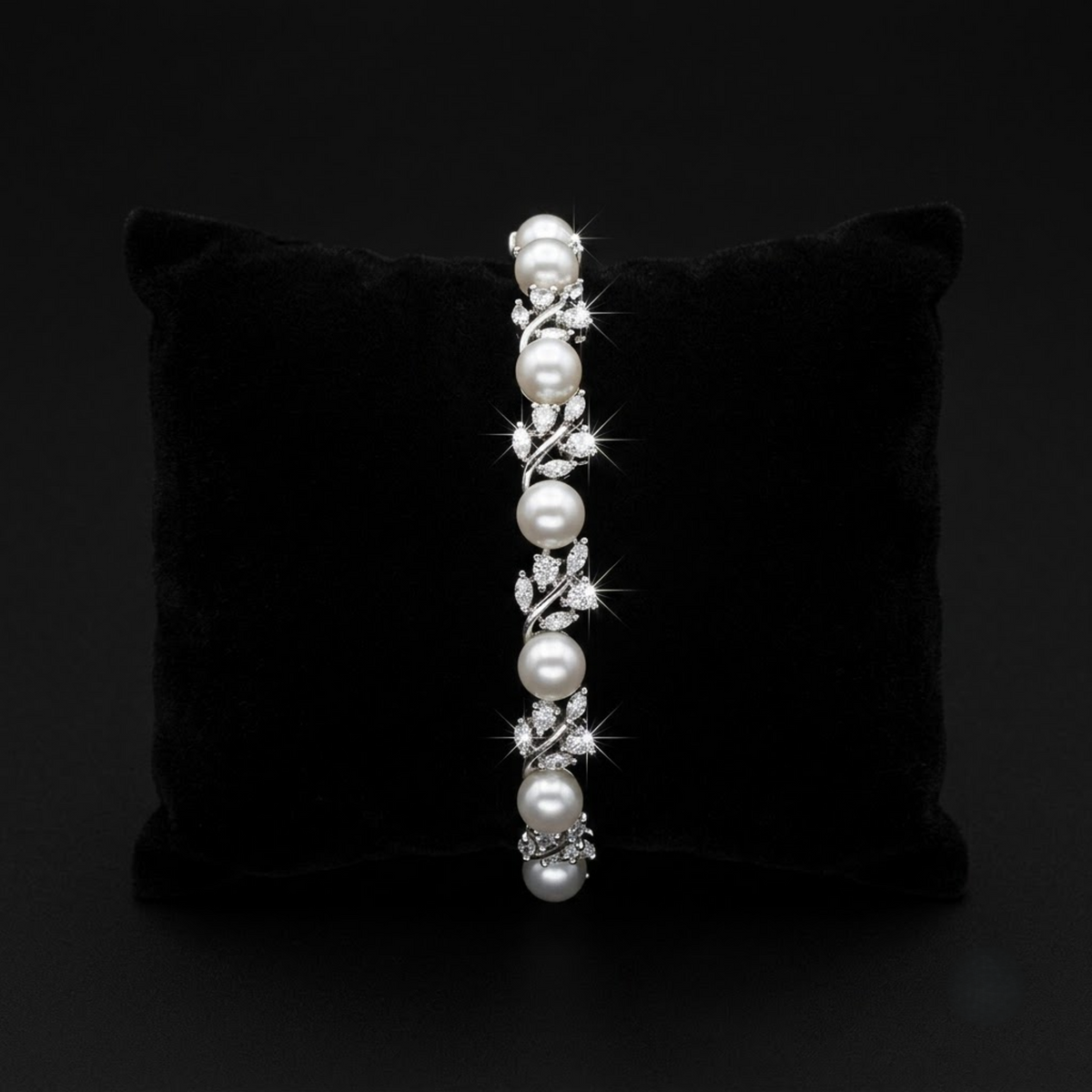 Onyxia Pearl Sparkling AD Bracelet with white pearls and leaf-inspired American Diamond AD stones, elegant designer pearl bracelet for women by ENAVA.