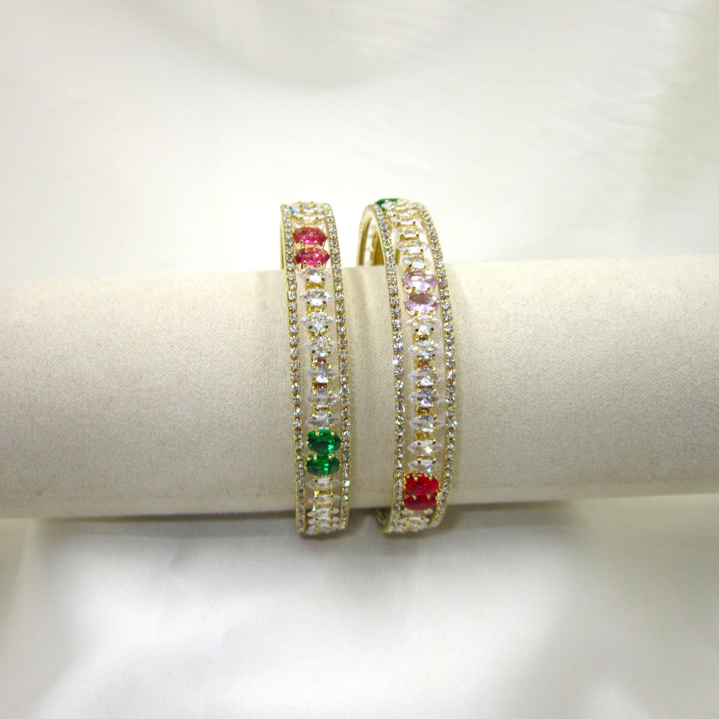 Rajkumari Gold Plated CZ AD Kada Bangles by ENAVA featuring white Cubic Zirconia American Diamonds with ruby red, emerald green and blush pink stones, premium gold plated bridal kada bangles for weddings, festive occasions, ethnic wear, and party jewellery.