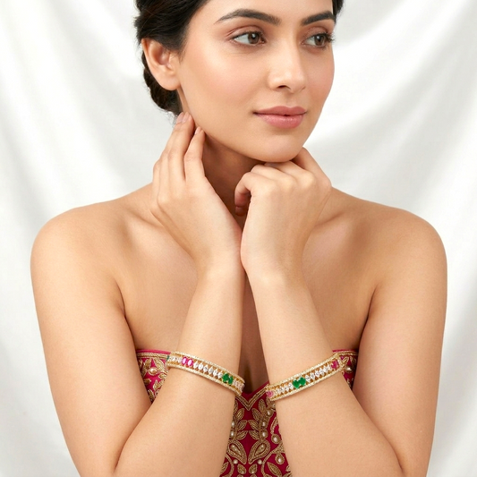 Rajkumari Gold Plated CZ AD Kada Bangles by ENAVA featuring white Cubic Zirconia American Diamonds with ruby red, emerald green and blush pink stones, premium gold plated bridal kada bangles for weddings, festive occasions, ethnic wear, and party jewellery.