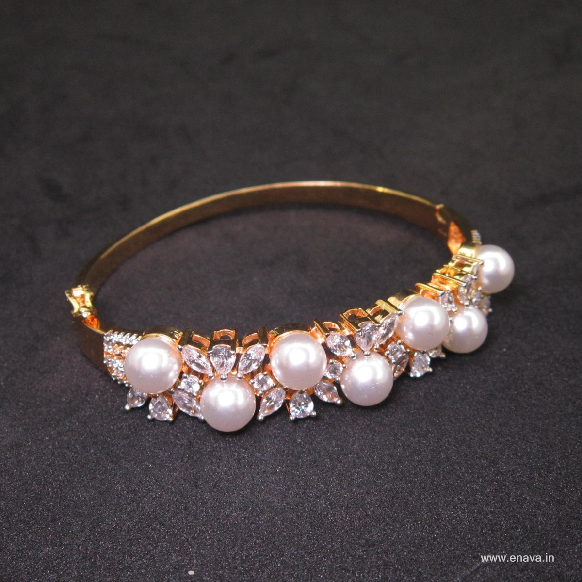 Pearl Nector AD Bracelet with sparkling American Diamond AD stones and bold large white pearl, elegant designer pearl bracelet for women by ENAVA.