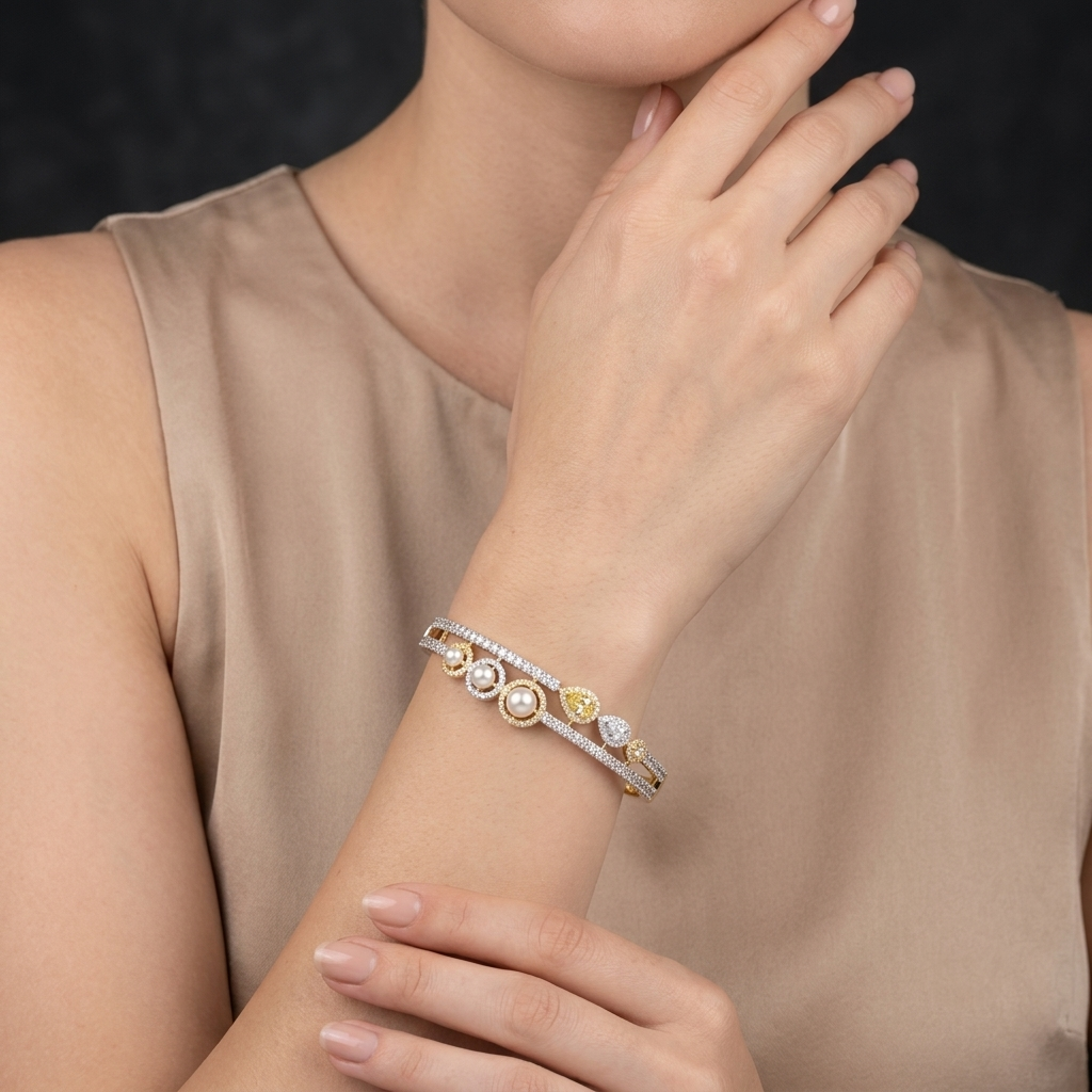 Pearl Oasis AD Bracelet with pearls, sparkling American Diamond stones and drop-shaped center AD in dual-tone finish, designer pearl bracelet for women by ENAVA.