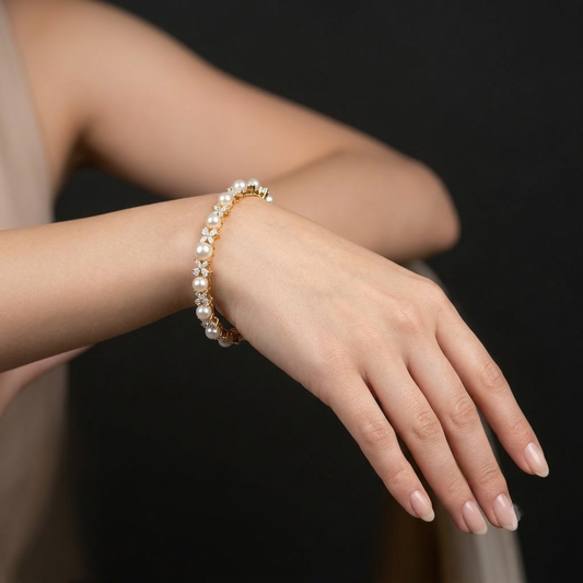 Pearlina AD Pearl Bracelet with alternating American Diamond AD stones and white pearls in a slim designer pattern, elegant pearl bracelet for women by ENAVA.