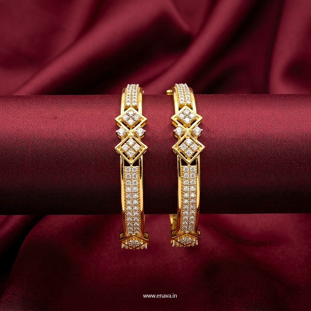 Prestige Gold Plated CZ AD Kada Bangles by ENAVA featuring sparkling clear white Cubic Zirconia American Diamond stones with elegant geometric motifs and premium gold plating. Luxury bridal kada bangles perfect for weddings, receptions, festive occasions, party wear, and designer jewellery collections.