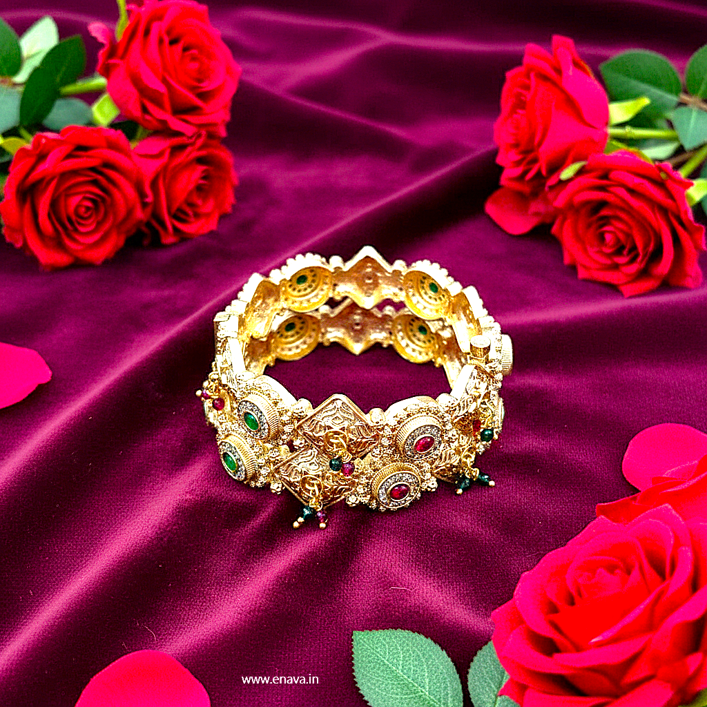 Rajwadi Ruby Green Stones Ghungaru Kundan Gold Plated Bangles by Enava Bangle Enava Jewels.