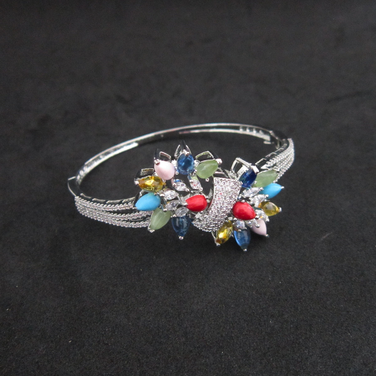 Rang Noor Multicolor Bracelet with colorful American Diamond AD stone flower designs, vibrant designer bracelet for women by ENAVA.