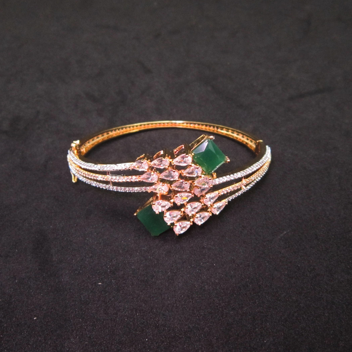 Rivaah AD Green Emerald Bracelet with two green emerald stones and sparkling American Diamond detailing, elegant designer bracelet for women by ENAVA.