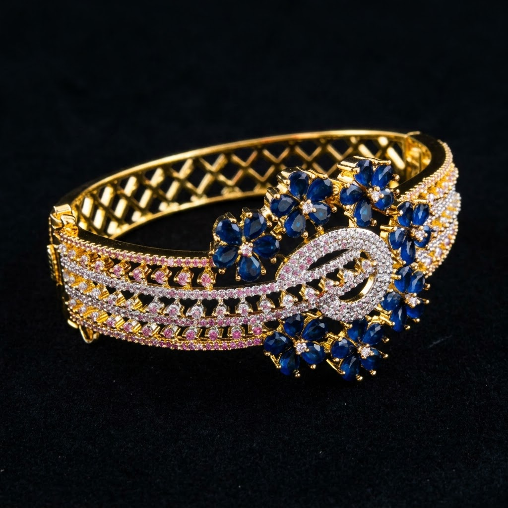 Royal Celestra AD Bracelet with dark blue American Diamond center motif, sparkling AD detailing and luxurious golden finish, designer bracelet for women by ENAVA.