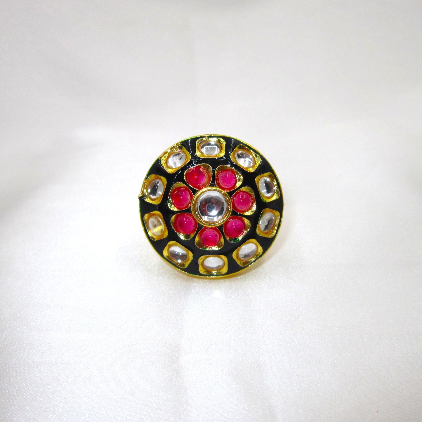 Ruhani Noir Ethnic & Traditional Kundan Black Golden Ring by Enava featuring white kundan stones, ruby pink accents, black meenakari, gold plating, adjustable statement ring for weddings, festive occasions, and traditional ethnic jewellery.