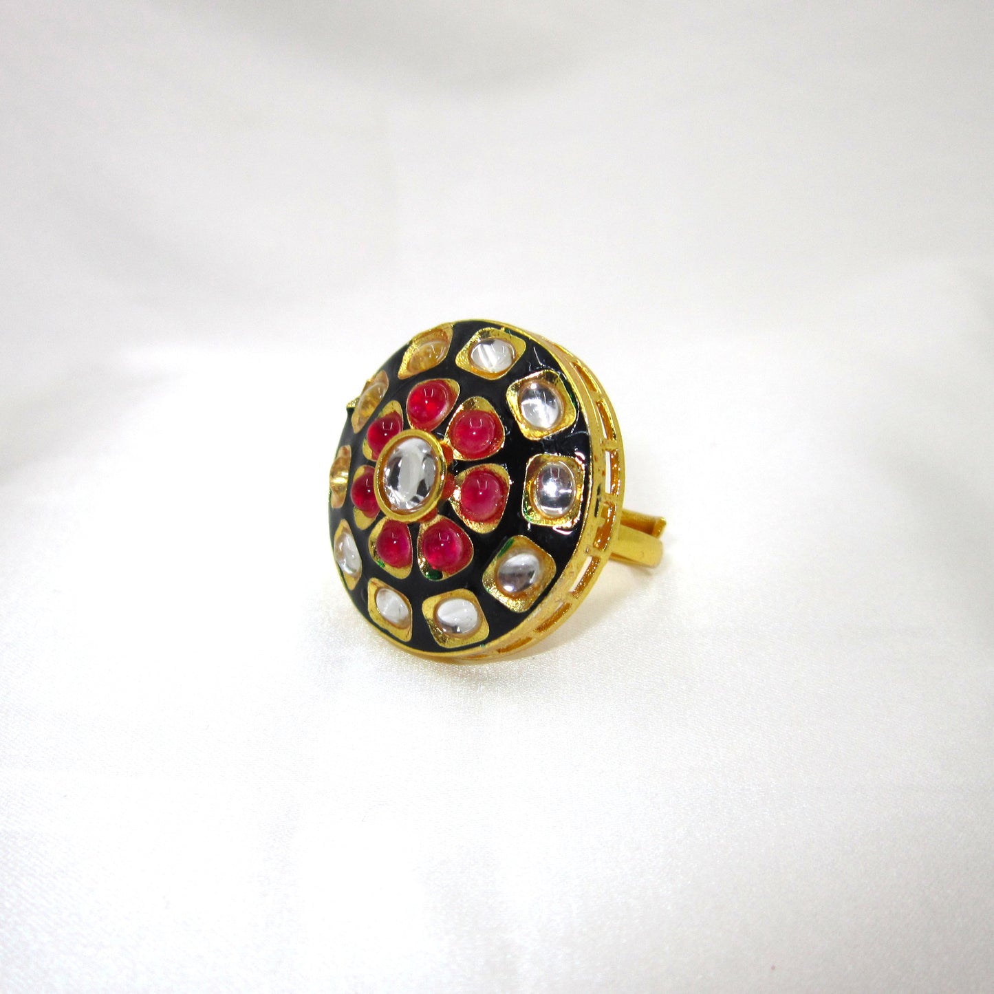 Ruhani Noir Ethnic & Traditional Kundan Black Golden Ring by Enava featuring white kundan stones, ruby pink accents, black meenakari, gold plating, adjustable statement ring for weddings, festive occasions, and traditional ethnic jewellery.