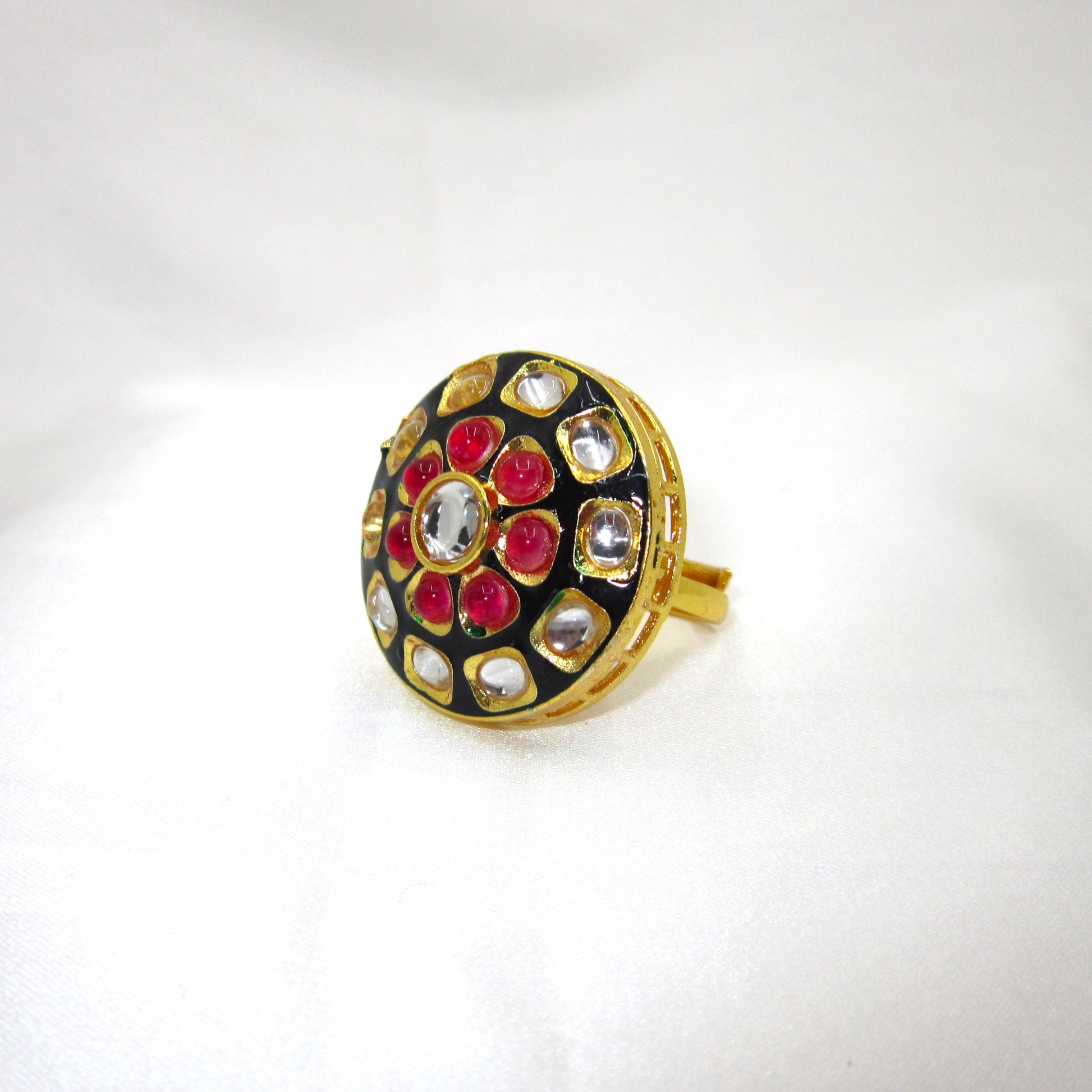 Ruhani Noir Ethnic & Traditional Kundan Black Golden Ring by Enava featuring white kundan stones, ruby pink accents, black meenakari, gold plating, adjustable statement ring for weddings, festive occasions, and traditional ethnic jewellery.