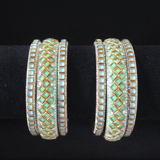 Sitara Chaukor Radium Festive Bangle Set with 2 kada bangles and 4 side bangles featuring radium green square-patterned detailing, golden latticework and sparkling stones by ENAVA