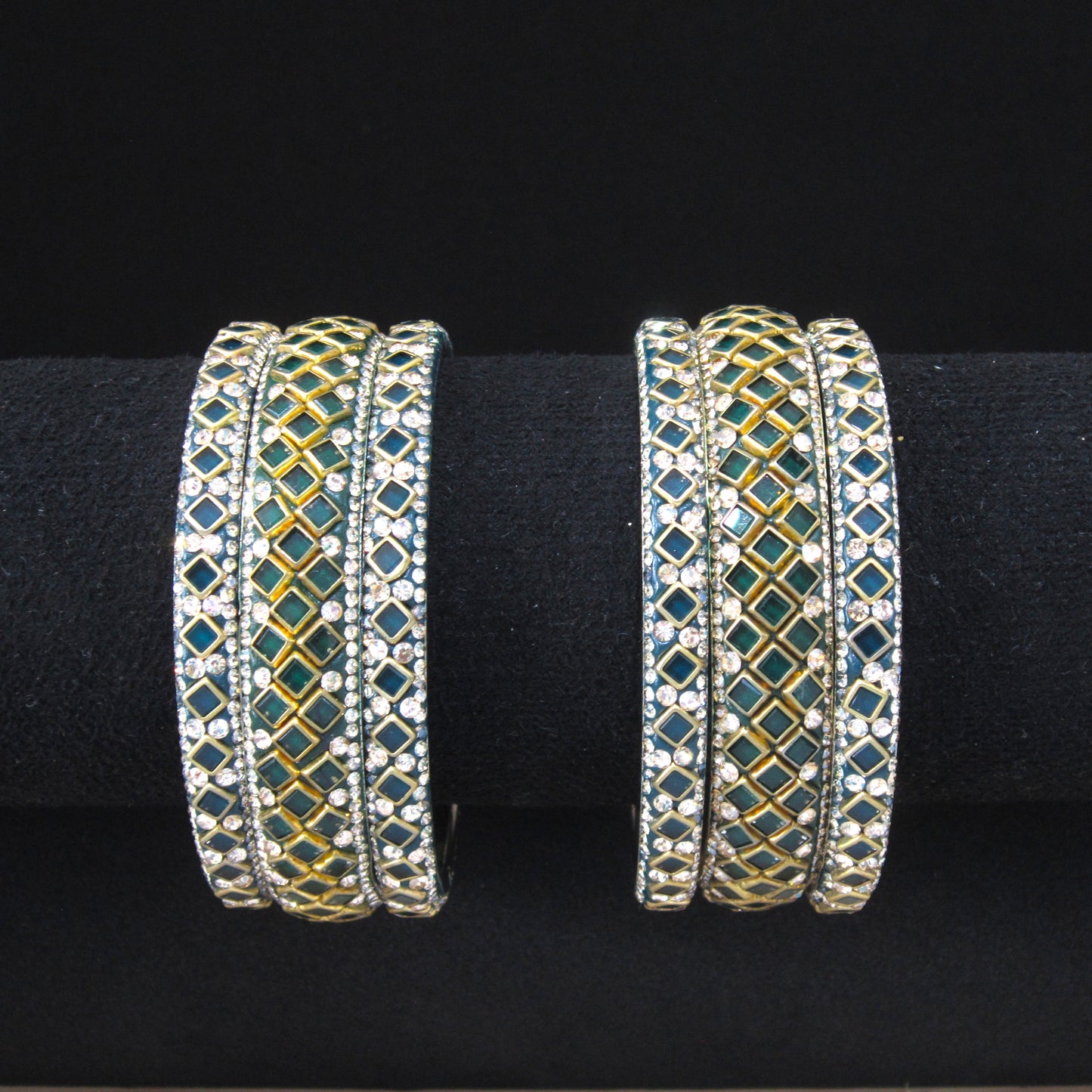 Sitara Dark Green Festive Bangle Set with 2 kada bangles and 4 side bangles featuring dark green detailing, golden latticework and sparkling stones by ENAVA