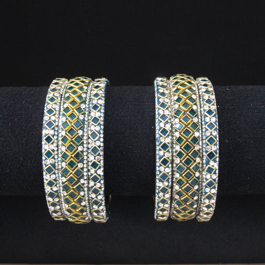Sitara Dark Green Festive Bangle Set with 2 kada bangles and 4 side bangles featuring dark green detailing, golden latticework and sparkling stones by ENAVA