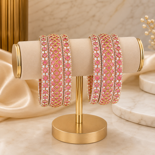 Sitara Gajari Peach Festive Bangle Set with 2 kada bangles and 4 side bangles featuring gajari peach detailing, golden latticework and sparkling stones by ENAVA