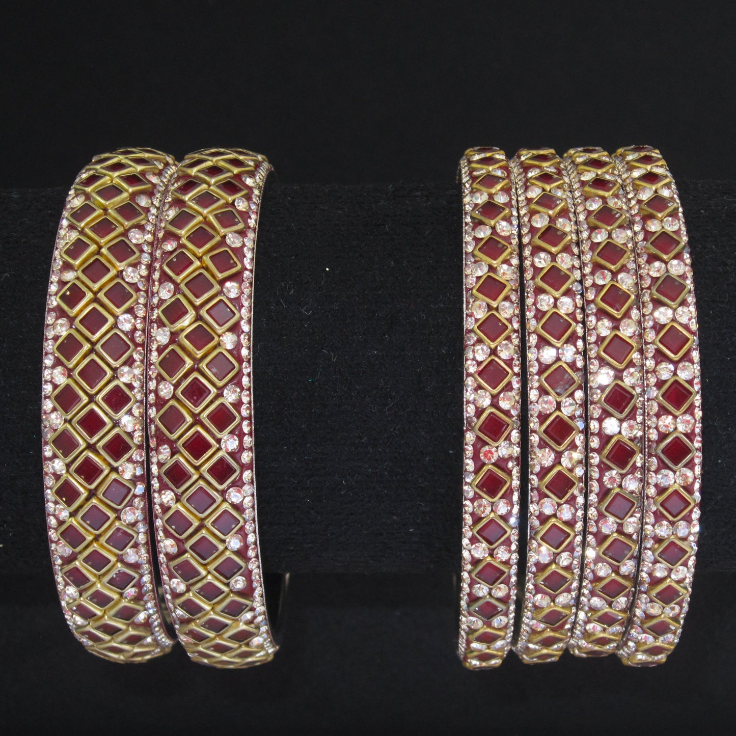 Sitara Maroon Festive Bangle Set with 2 kada bangles and 4 side bangles featuring rich maroon detailing, golden latticework and sparkling stones by ENAVA