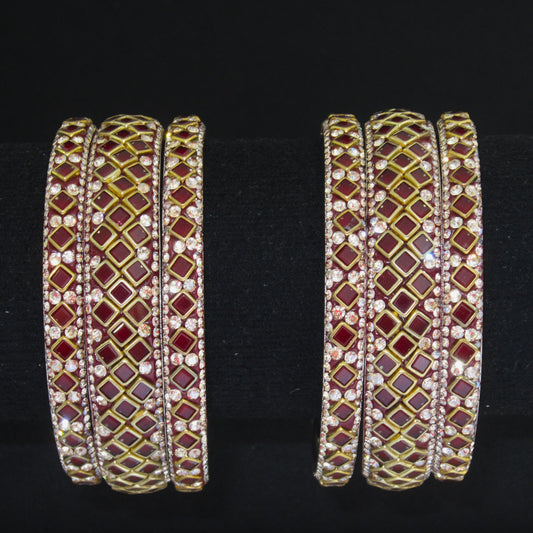 Sitara Maroon Festive Bangle Set with 2 kada bangles and 4 side bangles featuring rich maroon detailing, golden latticework and sparkling stones by ENAVA