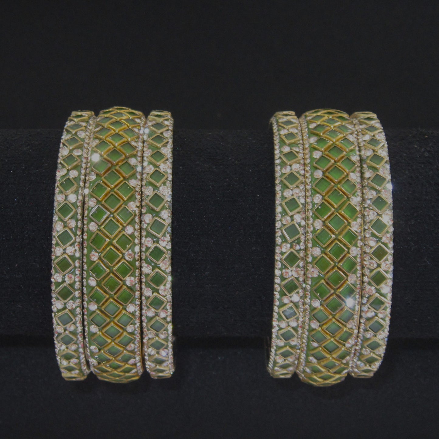 Sitara Mehendi Festive Bangle Set with 2 kada bangles and 4 side bangles featuring green detailing, golden latticework and sparkling stones by ENAVA