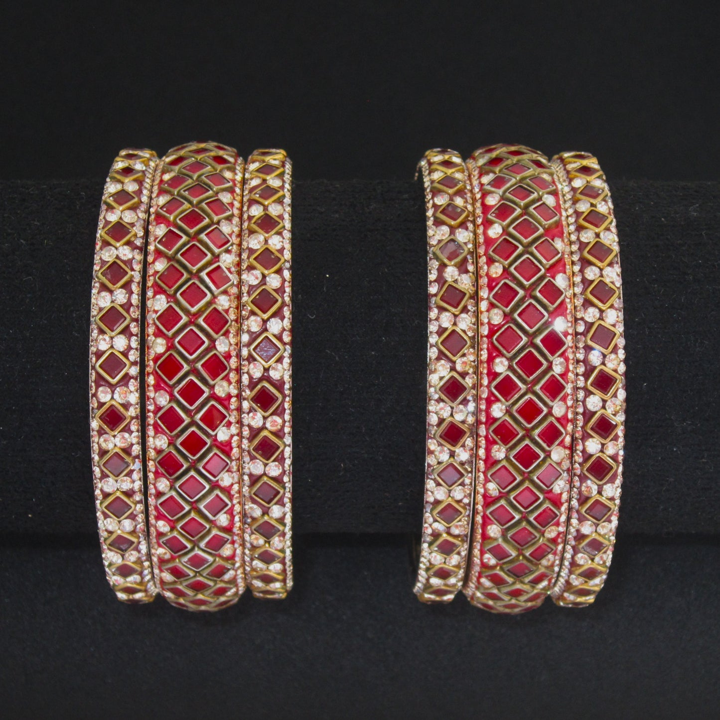 Sitara Red Maroon Festive Bangle Set with 2 kada bangles and 4 side bangles featuring maroon red detailing, golden latticework and sparkling stones by ENAVA