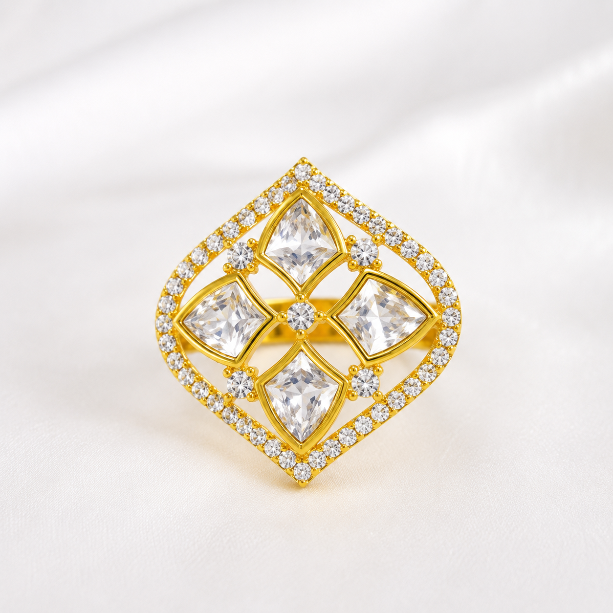 Stella Bloom Designer AD CZ Ring by Enava featuring princess-cut American Diamond Cubic Zirconia stones, gold-plated floral statement design, adjustable party wear ring for weddings, festive occasions, cocktail parties, and elegant celebrations.