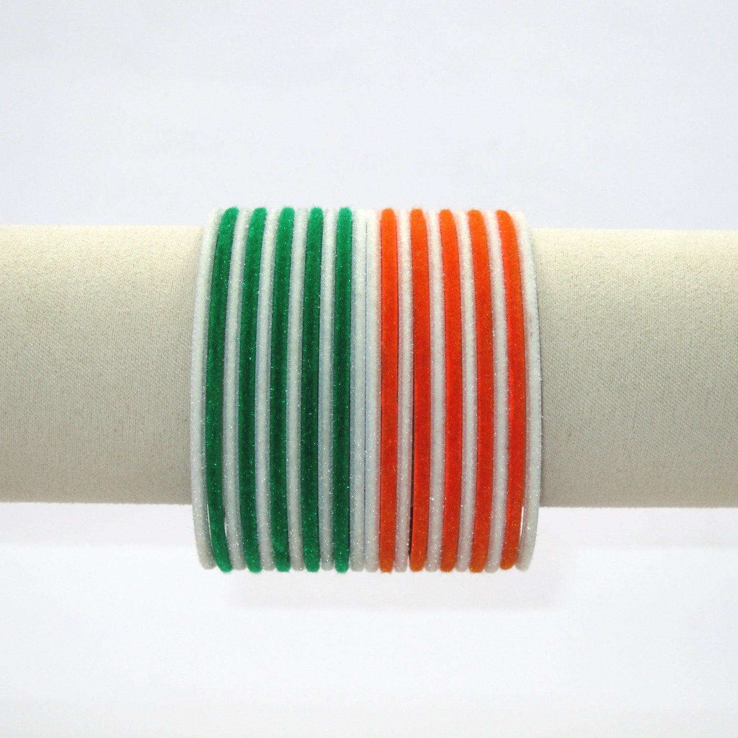 Eternal Tiranga Glossy Metal Bangles by Enava featuring a premium set of 24 glossy aluminum bangles in saffron, white, and green tricolor combination for Independence Day celebrations, patriotic events, cultural programs, festive occasions, and traditional ethnic wear.