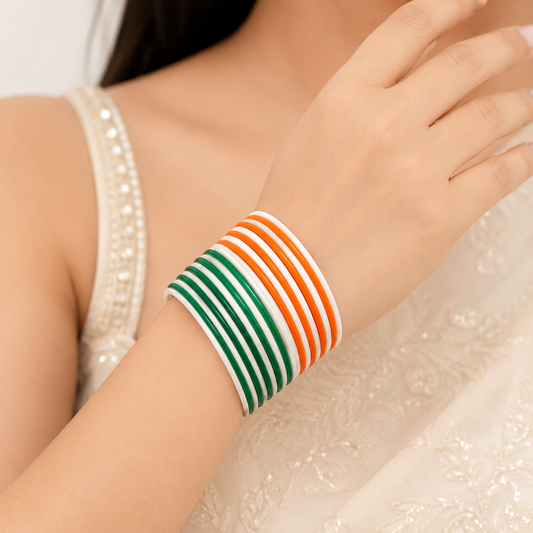 Eternal Tiranga Glossy Metal Bangles by Enava featuring a premium set of 24 glossy aluminum bangles in saffron, white, and green tricolor combination for Independence Day celebrations, patriotic events, cultural programs, festive occasions, and traditional ethnic wear.